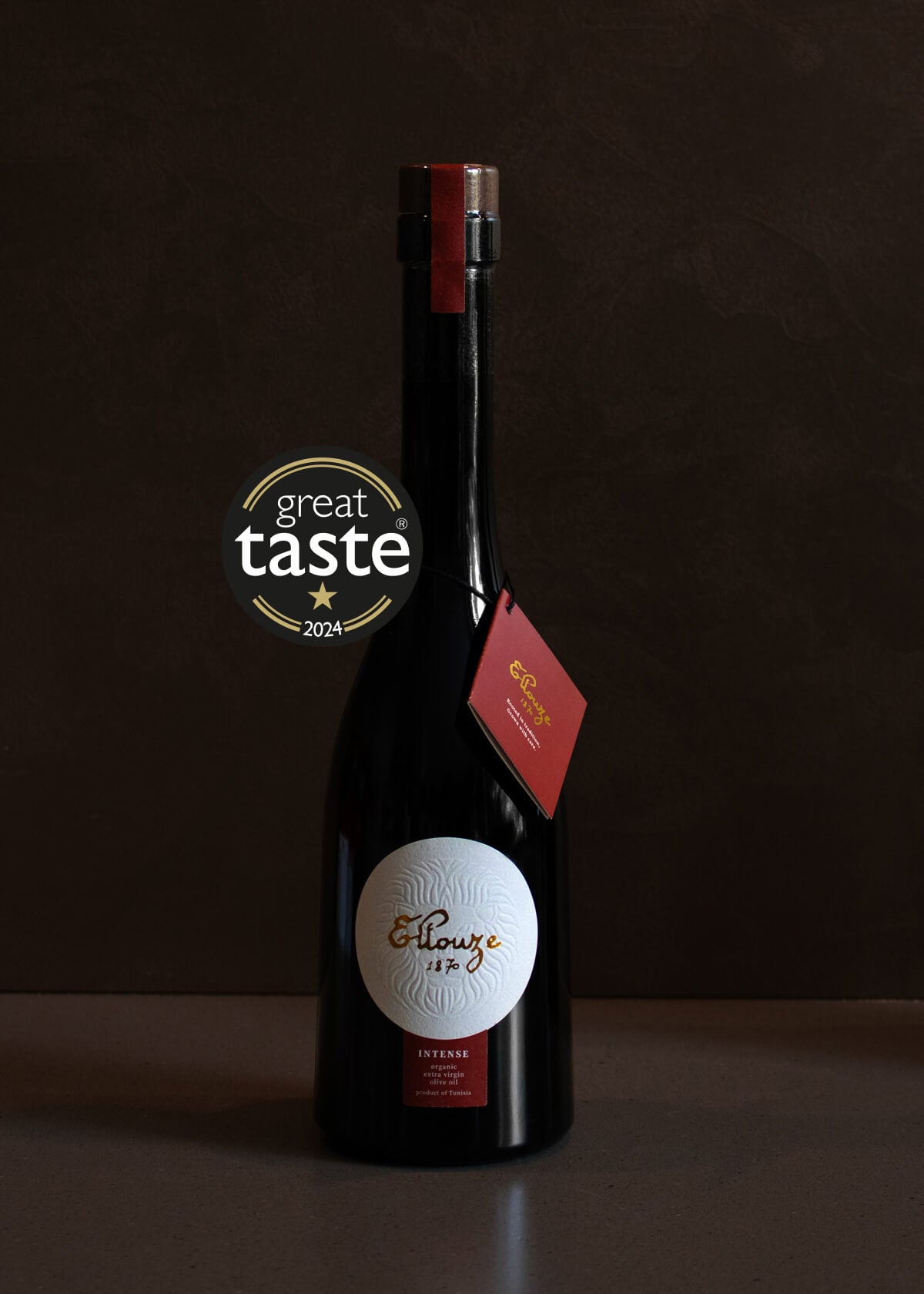 Bottle of Intense Organic Extra Virgin Olive Oil 500ml, showcasing rich flavor and premium quality.